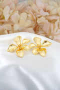 ARETES FLOR GRANDE CON TEXTURA