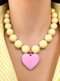 COLLAR CHICLE AMARILLO CON ROSA