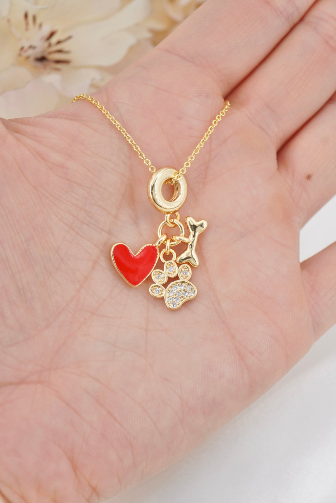 COLLAR CON HUELLITA DE PERRO Y HUESO