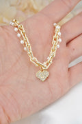 PULSERA DOBLE CON PERLAS Y CORAZON